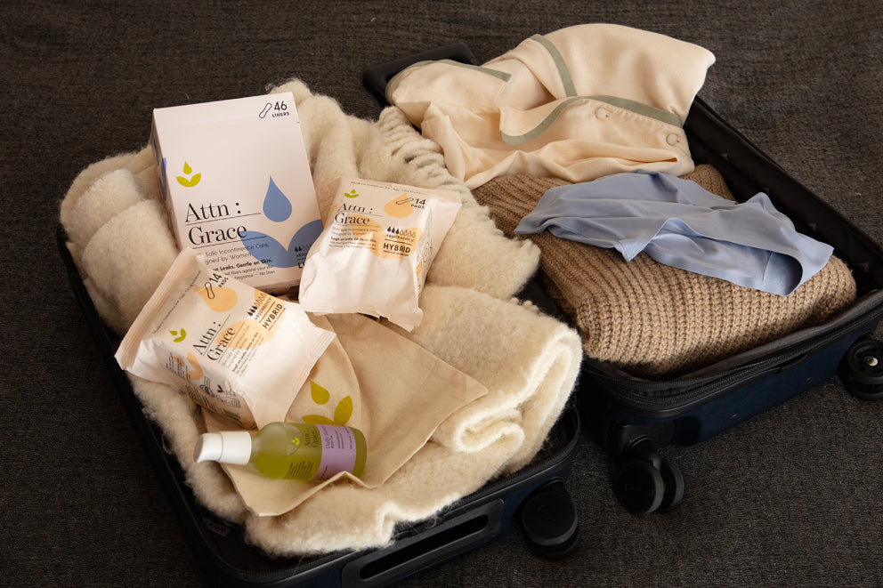 Attn: Grace products in an open suitcase